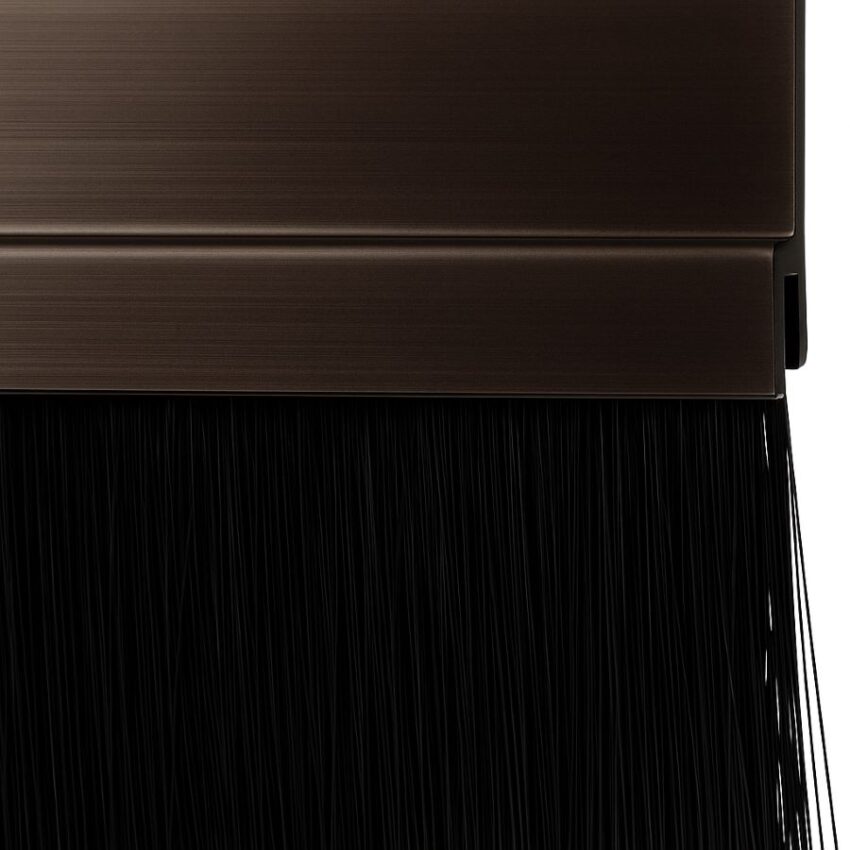 Close‑up of dark bronze anodized aluminum housing and nylon bristles