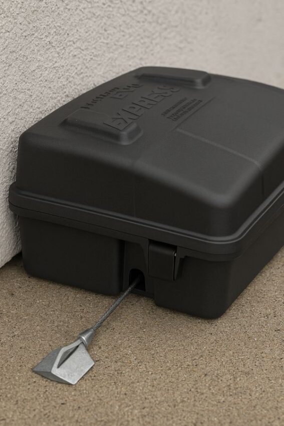 EVO Express positioned against a wall and secured using rear mounting holes or a duckbill anchor.