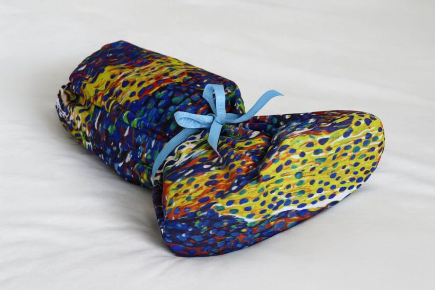 Walking boot fully covered to prevent Velcro snagging and keep sheets clean.