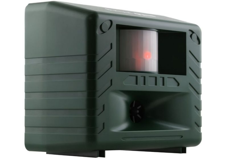 Bird-X Yard Gard ultrasonic animal repeller showing motion sensor window and front speaker